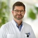 Oscar Brouwer met achtergrond hal